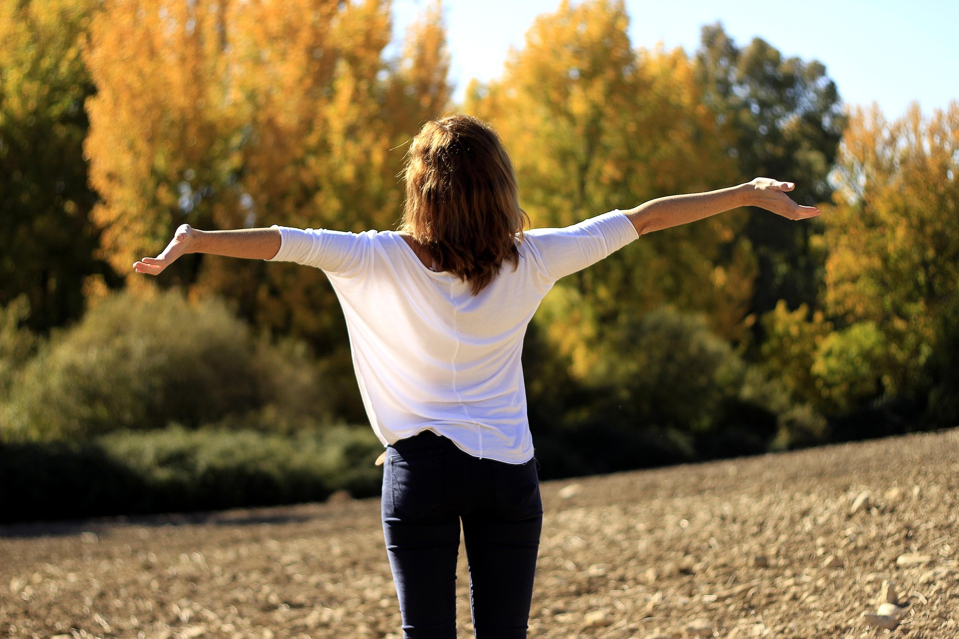 Woman enjoying the fresh air outdoors.
