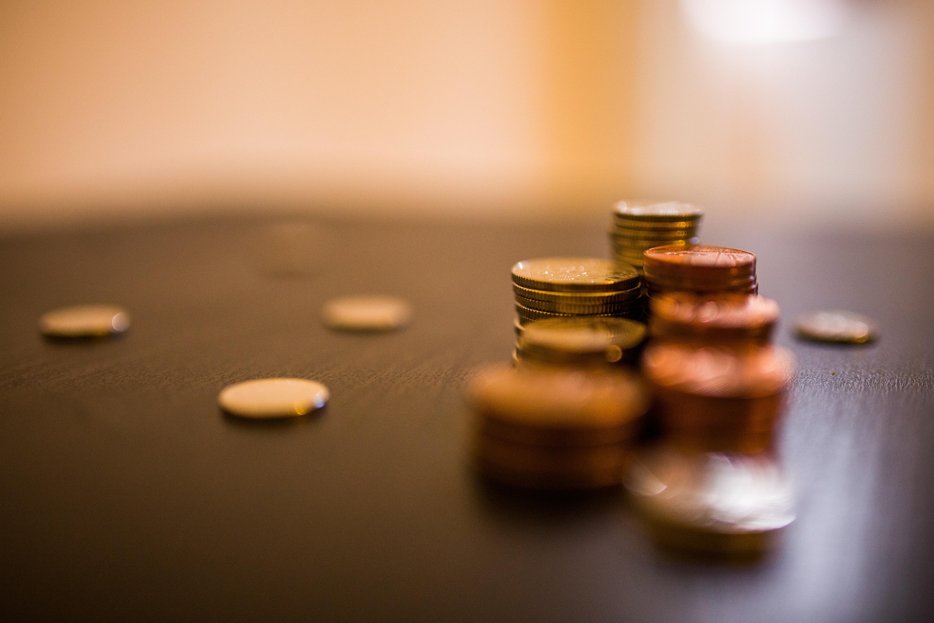 Various piles of silver coins.