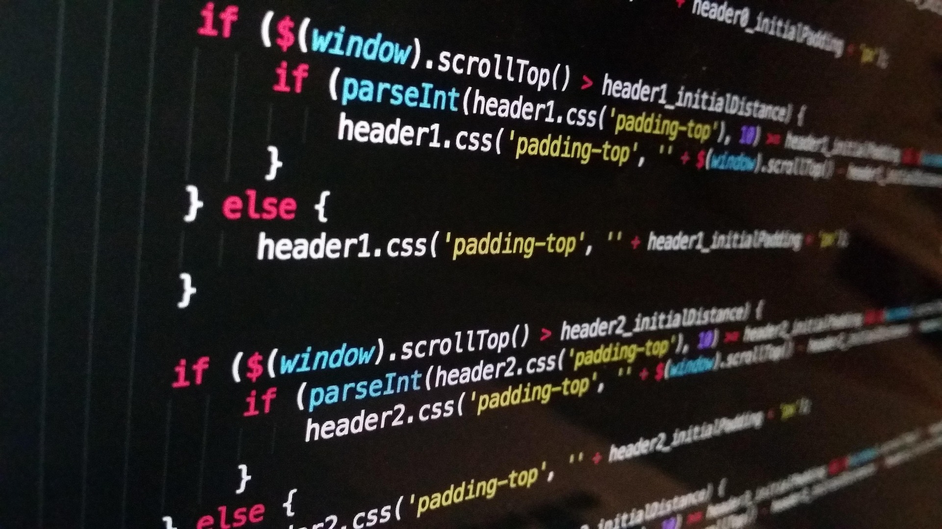 Lines of code and coding on a computer screen at an angle.