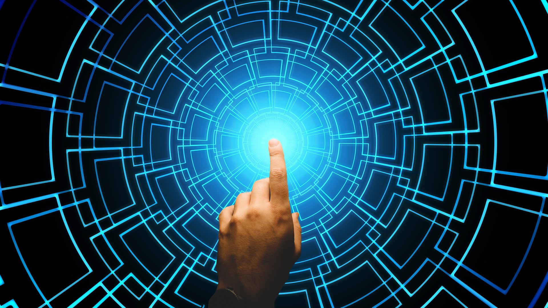 A hand pressing a central light in a technology grid like circle (AI).
