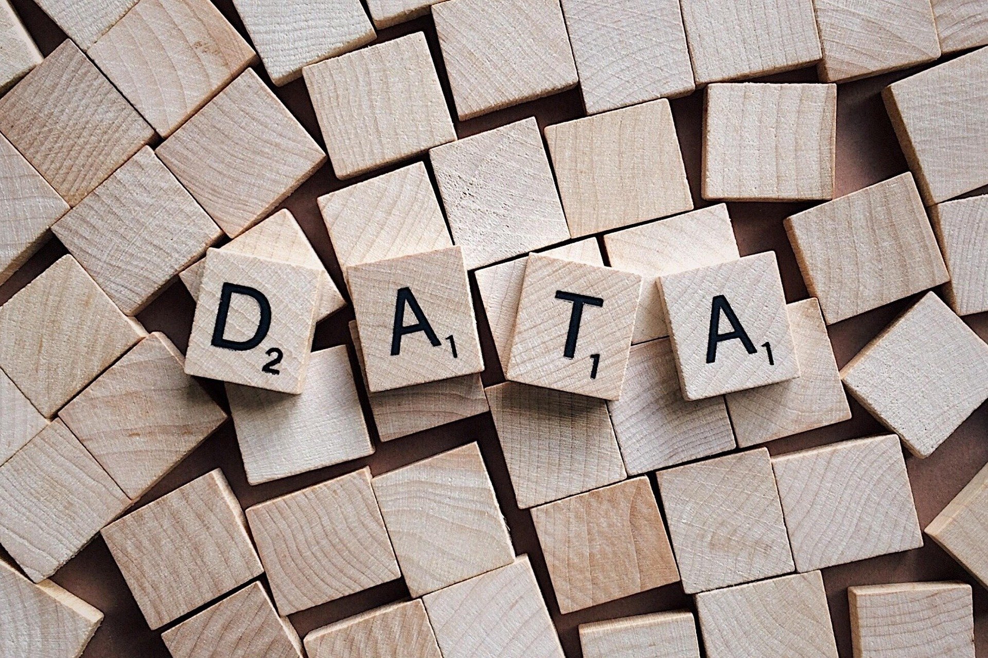 A jumble of Scrabble letters spelling out Data.