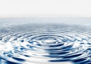 Concentric circles, wave like pattern, rippling water.