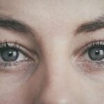 A close up of the eyes and face of a woman.