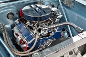 Under the hood is a souped-up shiny car engine.