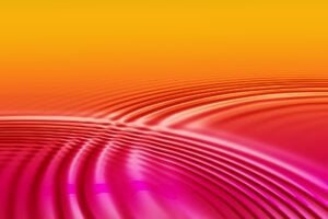 Concentric circles or waves/ripples of water on a light orangey background.