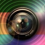 Graphic of a camera lens on a radar-like background.