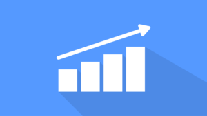 A retro looking bar chart with arrow pointing upwards to signify growth.
