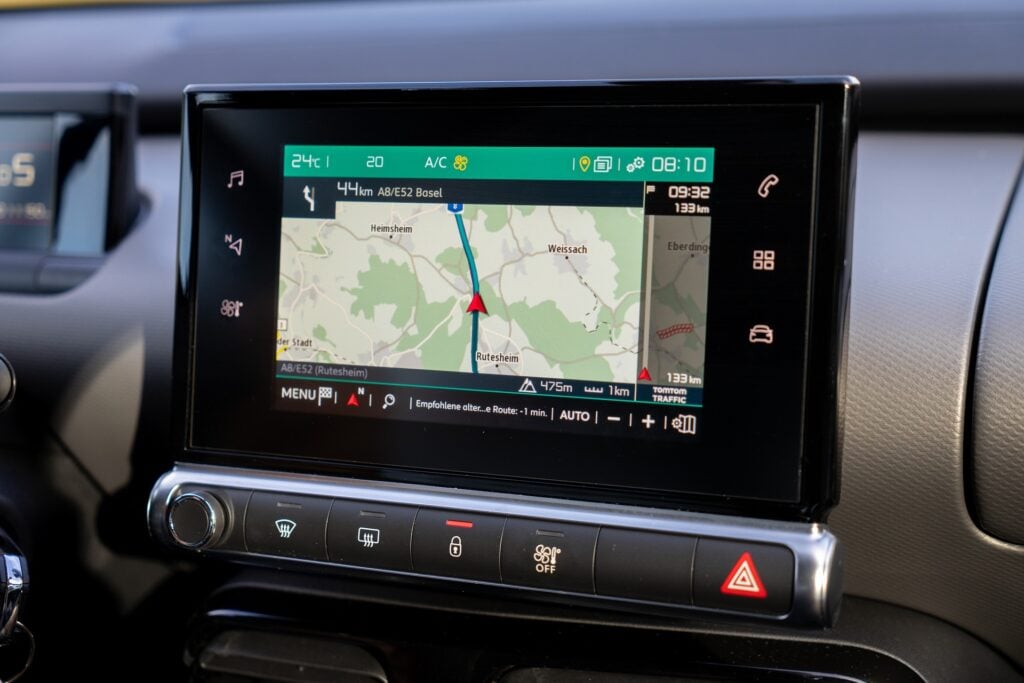 A GPS navigation screen dashboard in the car.