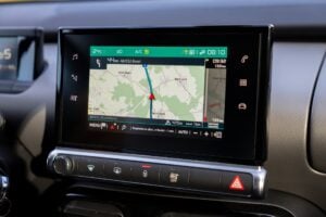 A GPS navigation screen dashboard in the car.