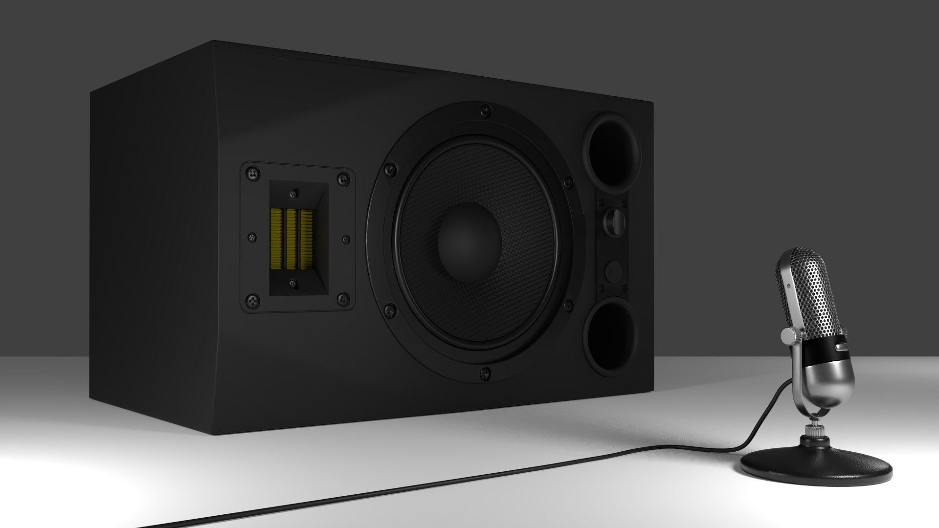 A large speaker with an older style microphone stand in front of it.