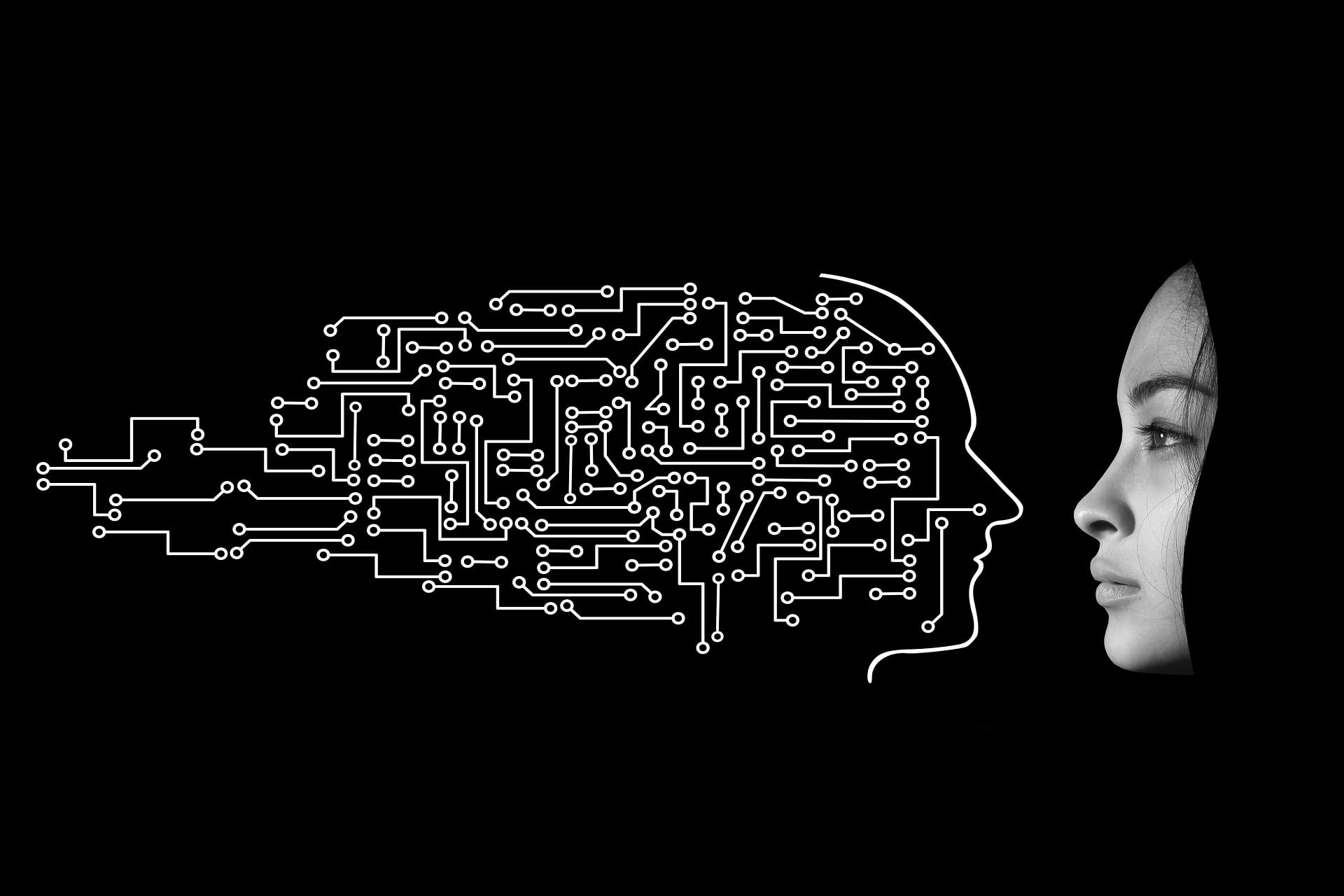 Profile of a woman facing a graphic of a robot-like head with circuits trailing behind it.