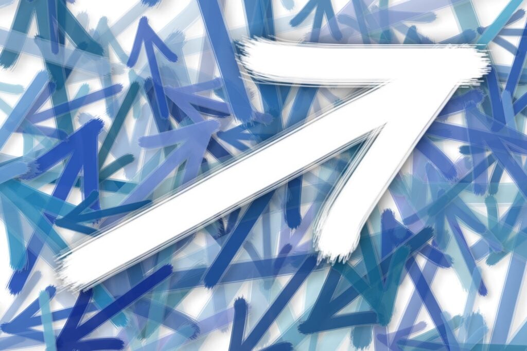 Graphic of a mix of arrows pointing in all directions, one large white arrow pointing upwards.